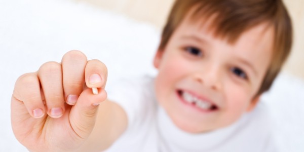 Ваши действия если у ребенка шатается коренной зуб